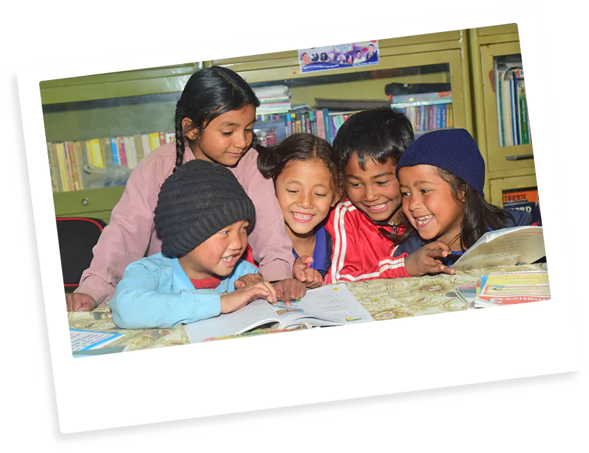 Photograph of kids studying together